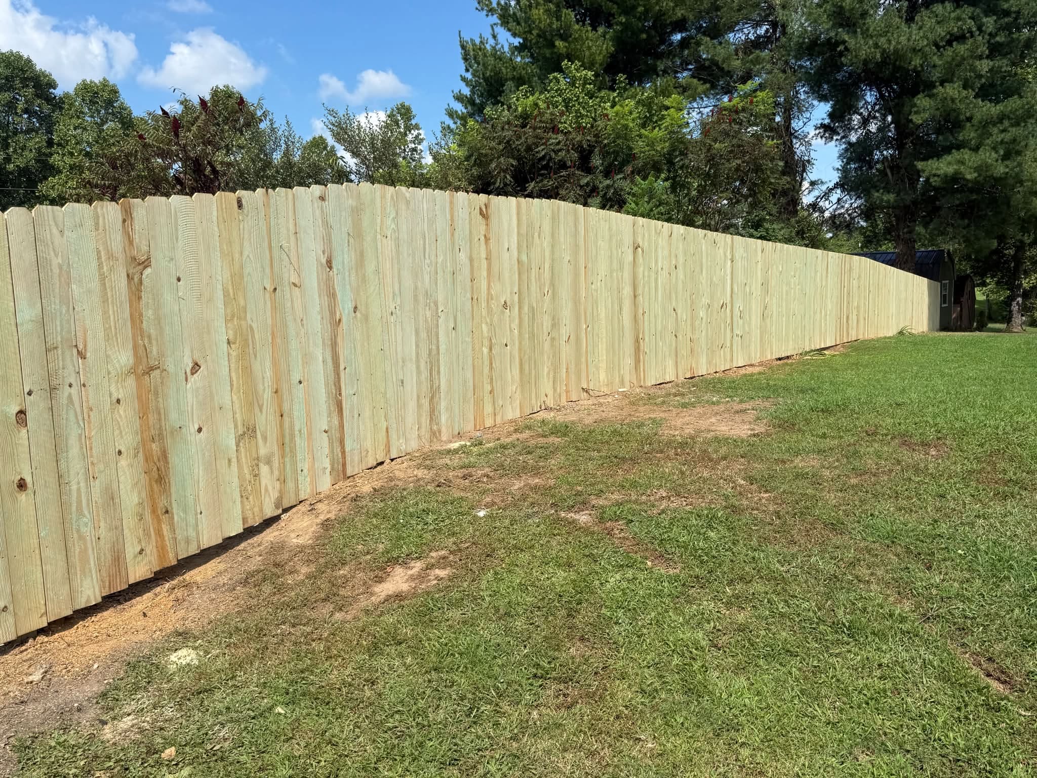 Close view of a wood privacy fence built by Tennessee Fence Systems
